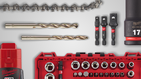 Collection of tools including a drill bit, chain, and Milwaukee tool set on a white background