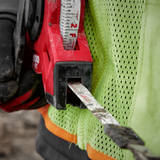 Close up of a red tape measure in a work environment