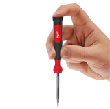 Hand holding a red and black Milwaukee screwdriver with a white background