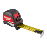 Milwaukee tape measure with red and black casing on a white background