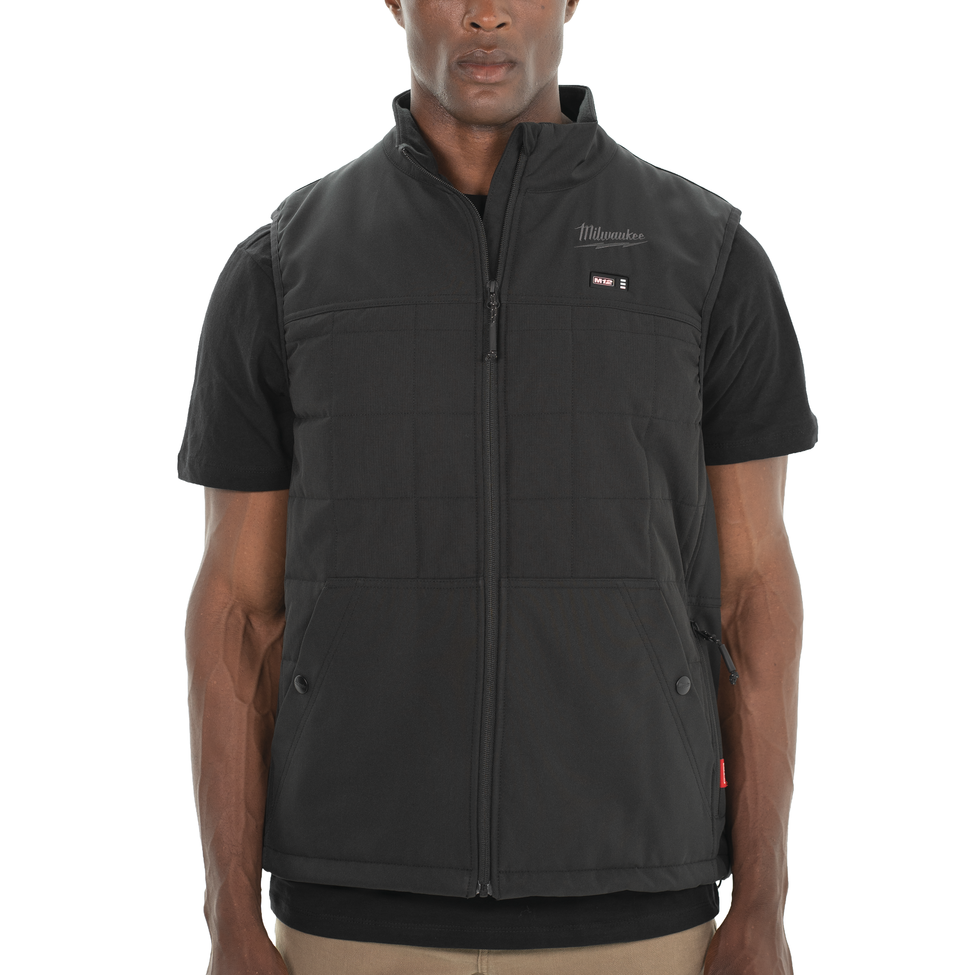 Person wearing a black Milwaukee vest
