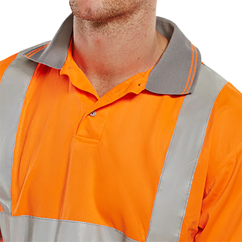 High visibility orange polo shirt close up of collar with reflective stripes worn by a person on a white background